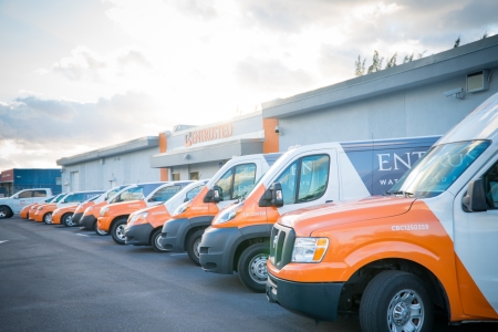 entrusted-restoration-service-vans.jpg Entrusted restoration service vans parked outside company headquarters ready for water and mold remediation response