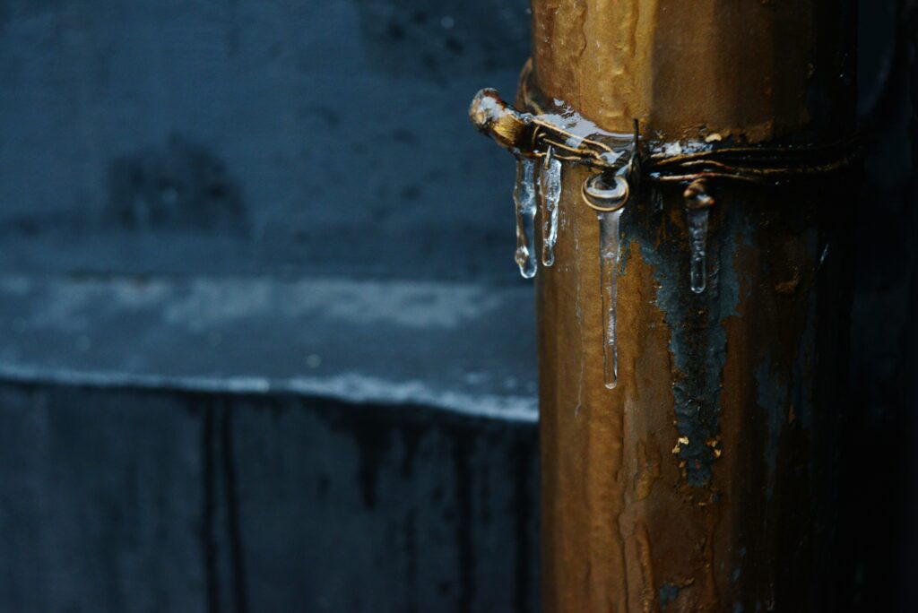 pipe burst causing water damage in a home